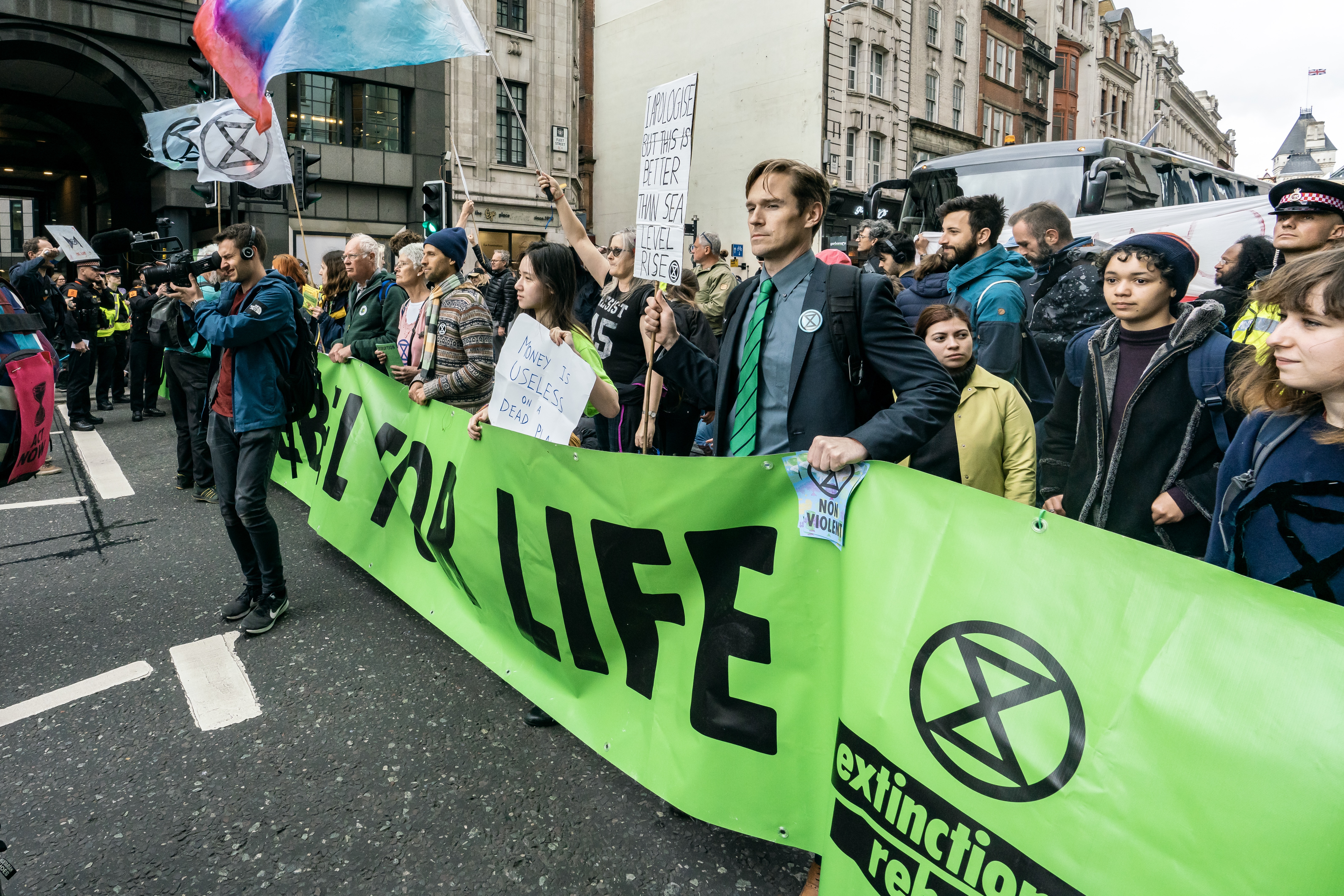 Extinction Rebellion activists with a banner during a London protest